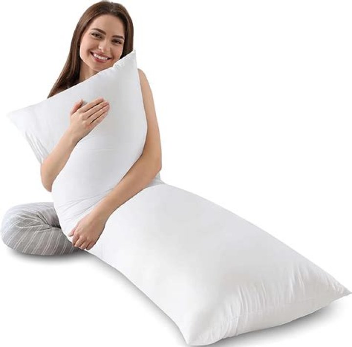 What are pillows with arms called